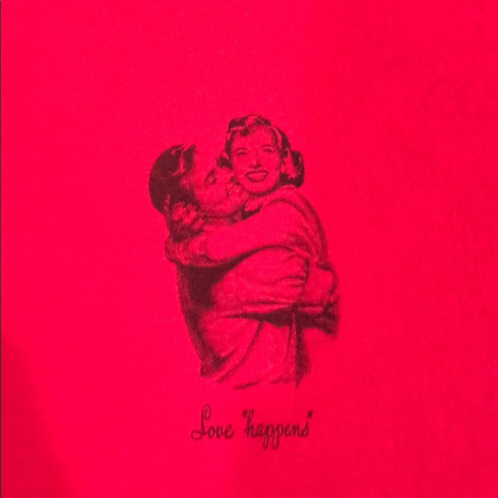 Love Happens graphic t-shirt